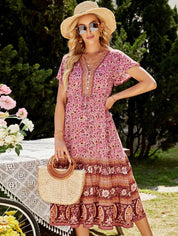 Boho stil kleid mit Blumenmuster und kurzen Ärmeln